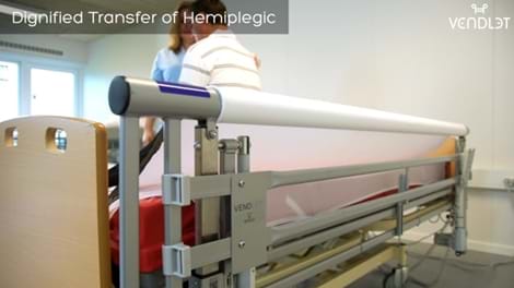 Dignified transfer of a hemiplegic client using a powered turning aid